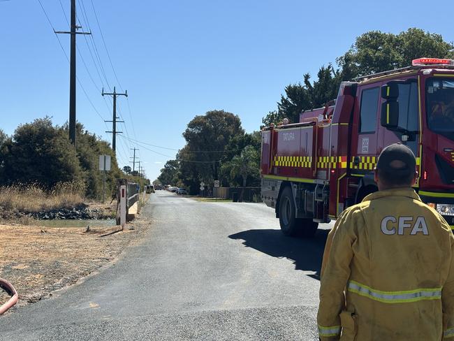 Emergency services respond to a fire involving a pile of cars in Kyabram. Picture: Abby Walter