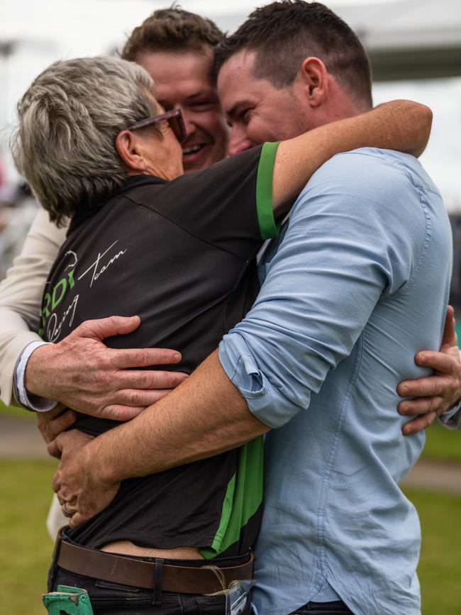 Bullion Wolf owners Denis Jackson and Scott Broodbank celebrate with stable foreman Beverley Gordy after their Cairns Amateurs Cup win. Picture: Emily Barker.