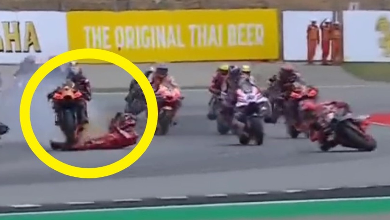 Francesco Bagnaia has his leg run over in a nasty MotoGP crash.