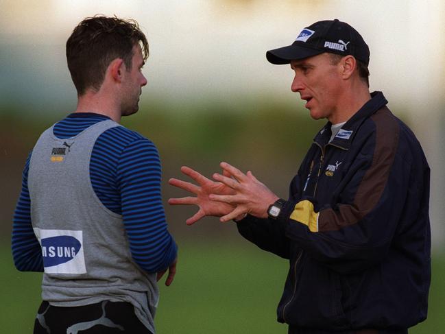 Daniel Harford getting some honest feedback from former coach Ken Judge in 1999.