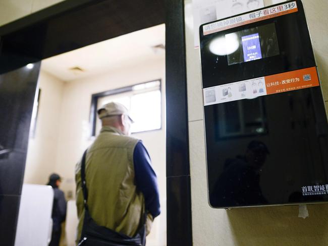 An automatic toilet paper dispenser that uses facial recognition technology at a public toilet at the Temple of Heaven in Beijing. Picture: Wang Zhao