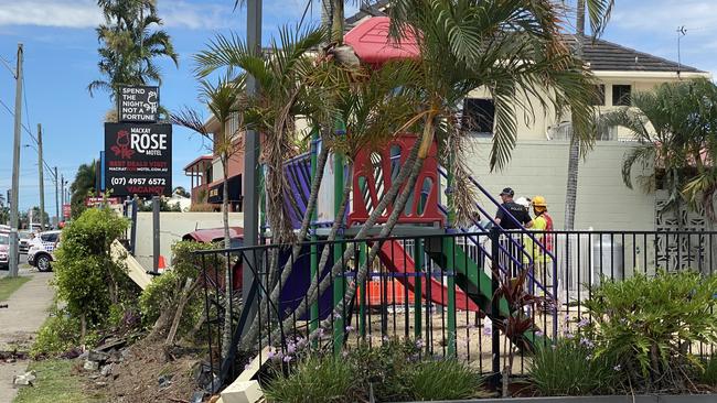 Emergency services were called to the Tropic Coast Motel along Nebo Rd in Mackay after a car crashed through a fence and landed in a plunge pool on November 13, 2021. Picture: Heidi Petith