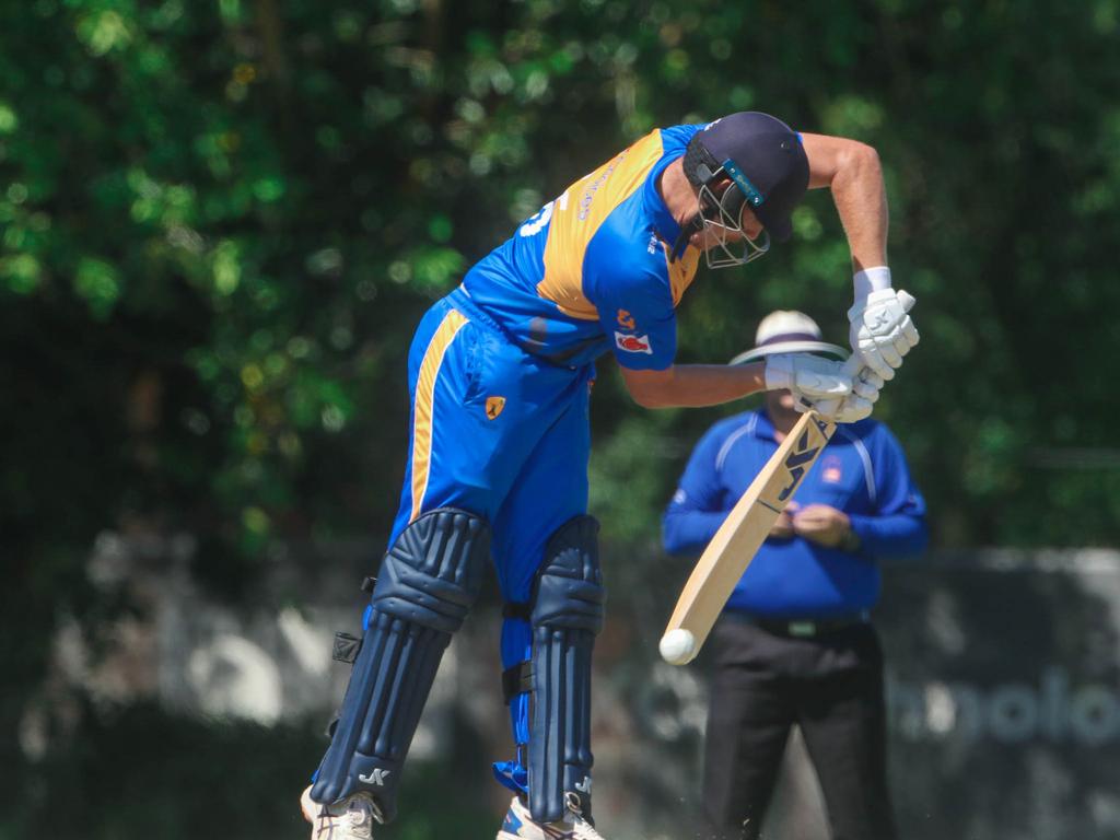 Jacob Dickman defends against Tracy Village last season. Picture Glenn Campbell.