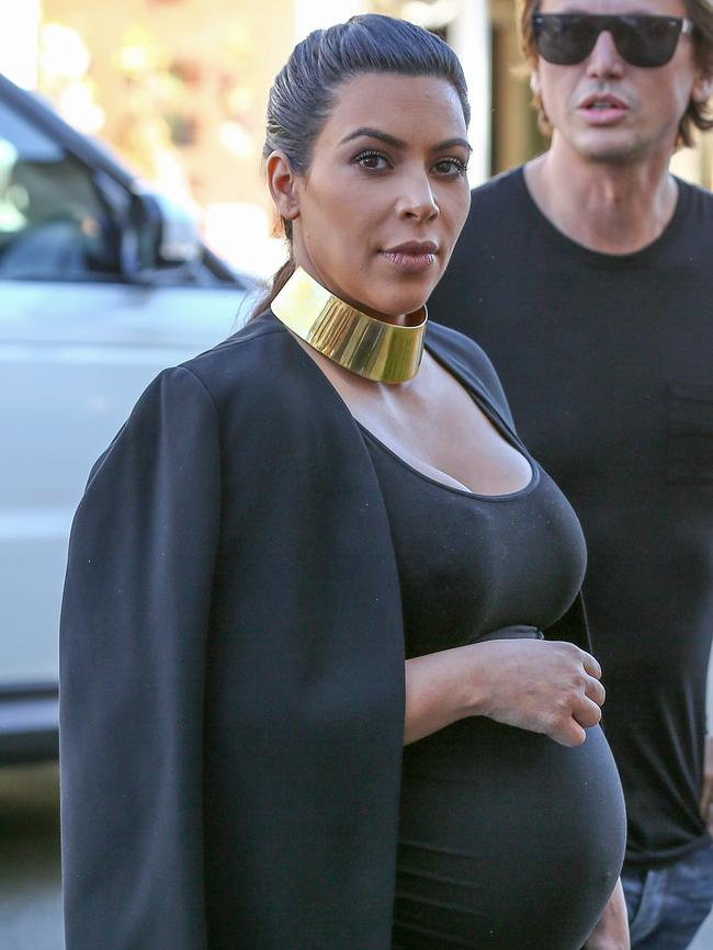 Kim showed off her bump while out with Jonathan Cheban. Picture: Splash News Australia