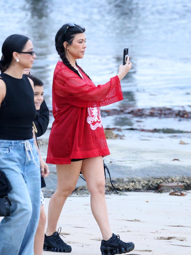 Kourtney seemingly snapped a selfie on the sand at Palm Beach.