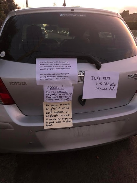 A neighbourhood dispute has spilled out on to a car. Picture: Facebook