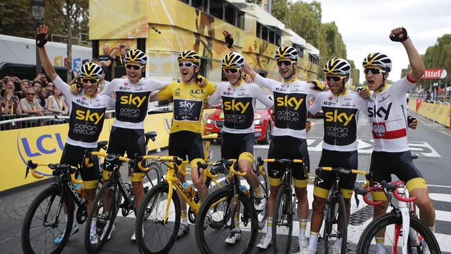 Team Sky from left, Spain's Jonathan Castroviejo, Britain's Luke Rowe, Tour de France winner Britain's Geraint Thomas, Britain's Chris Froome, Netherlands' Wout Poels, Colombia's Egan Arley Bernal Gomez and Poland's Michal Kwiatkowski. (AP Photo/Francois Mori)