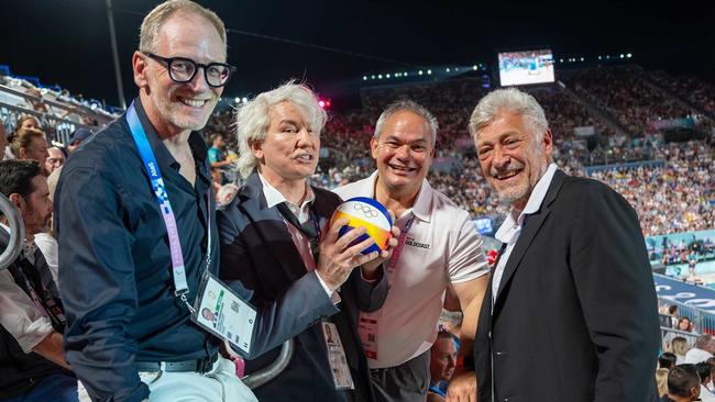 President of Volleyball Australia, Craig Carracher, pictured under the Eiffel Tower with film director Baz Luhrmann, Gold Coast Mayor Tom Tate and South American Volleyball Confederation (CSV) president Marco Tullio Teixeira. Picture: Supplied by Mayor Tom Tate via FIVB