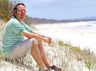 NO HAPPY ENDING: Andreas Krauchi on the beach in front of his Rainbow Shores development. Picture: Craig Warhurst C