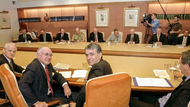 Attorney-General Phillip Ruddock (left), Prime Minister John Howard and Deputy Prime Minister John Anderson with other members of the National Security Committee (NSC). Picture: David Foote