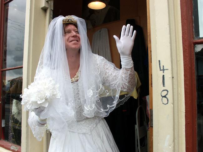 Hobart, May 13, 2004. Tasmanian accountant Mike Davis, who lives in Mary Donaldson's former family home at Taroona, frocks up ahead of the planned post-wedding bash on Saturday. The party will be held in honour of the marriage of Tasmanian Mary Donaldson to Prince Frederik of Denmark in Copenhagen on Friday night.  (AAP Image/Libby Sutherland) NO ARCHIVING