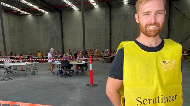 Division Seven candidate Joe Wilkinson scrutineering as he checks his votes at the Returning Officer headquarters at Arundel for the 2024 Gold Coast City Council election.