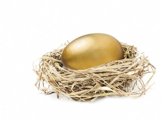 04/06/2012 NEWS: Golden egg. Nest. isolated on white. Superannuation. Generic image. Pic. Supplied