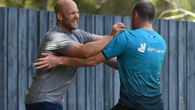 Gary Ablett and Jarryd Roughead fought it out in an entertaining training session inside the Gold Coast mini hub. Picture: Getty Images