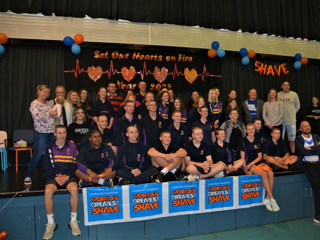 At the St Joseph's College 2023 World's Greatest Shave event are all the participating students, pictured with their families and hairdressers from the Hair Room on Russell. Picture: Rhylea Millar