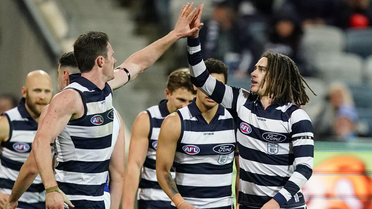 Gryan Miers celebrates a goal with Patrick Dangerfield last month.