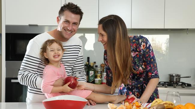 Matthew and Roxane Turnbull from Baulkham Hills, Sydney, with their daughter, Lucy. Picture: Adam Taylor