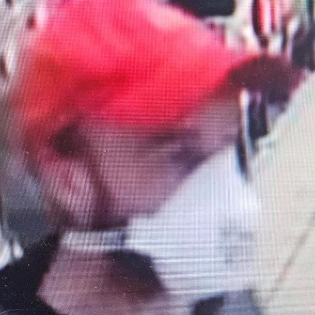 Image of a man police are looking to speak with in relation to an armed robbery at a Nerang supermarket on Monday night.