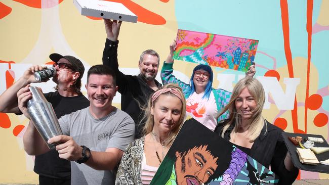 Council is launching a new free after-dark event in Southport targeted at 18+. Left to right, Gus Irwin, Greg Meyers, Arran Woollams, Tarsha Christie, Michelle Le Plastrier and Leila Kirk from local businesses around the CBD get ready for the party. Picture Glenn Hampson