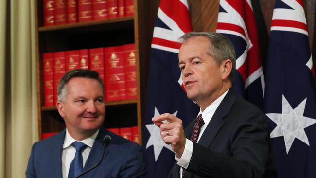 Labor leader Bill Shorten (R) and Shadow Treasurer Chris Bowen (L) hold a press conference in Melbourne, Friday, October 12, 2018. Labor are revealing today the ALP will back the Government's plan to fast-track tax cuts to small businesses. (AAP Image/David Crosling) NO ARCHIVING