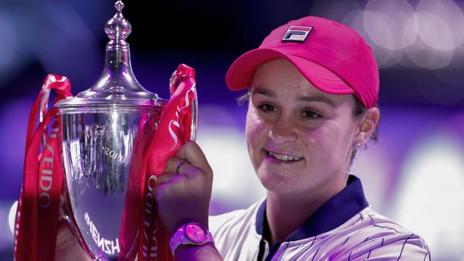 Ashleigh Barty of Australia poses with the trophy after defeating Elina Svitolina of Ukraine in the WTA Finals Tennis Tournament at Shenzhen. Picture: AP