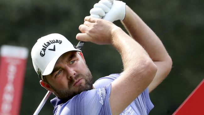 Marc Leishman of Australia tees off during the first round of the 2017 WGC-HSBC Champions golf tournament at the Sheshan International Golf Club in Shanghai, China Thursday, Oct. 26, 2017. (AP Photo/Ng Han Guan)