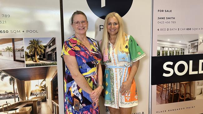 Vendor Susan Briant and Place Bulimba agent Anna Dunne. Ms Dunne said the vendors were happy the home went to a family.