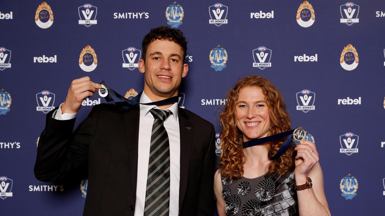 Tom Gribble (left) with his J.J. Liston Trophy in 2022. Picture: Getty Images