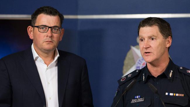 Deputy Commissioner Shane Patton with Premier Daniel Andrews. Picture: AFP