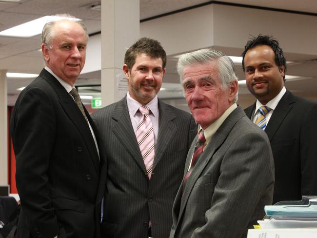 Stockbroking firm BBY directors David Perkins (L), CEO and managing director Glenn Rosewall (C), his father Ken and Arun Maharaj at their office in the Sydney CBD.