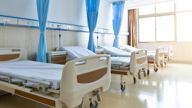 Interior of new empty hospital room. istock.