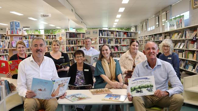 Clarence MP Chris Gulaptis  and Richmond Valley Mayor Robert Mustow surrounded by Casino Library staff.