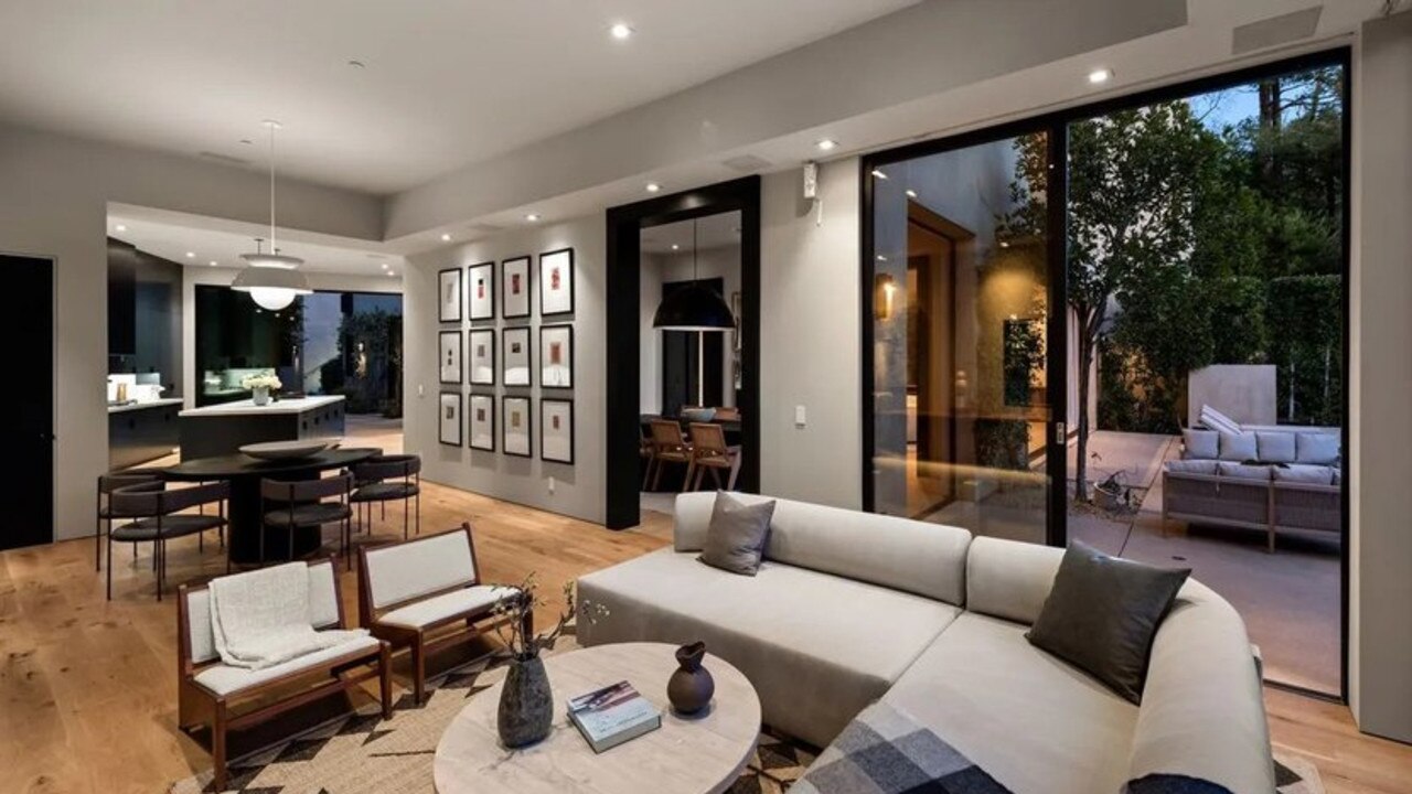 The living area seamlessly connects to the dining spaces. (Picture: Realtor.com)