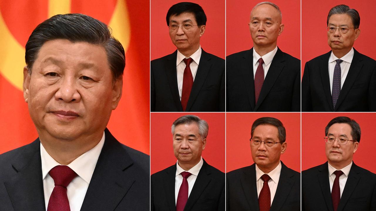 China's President Xi Jinping (left) and other new members of the Communist Party of China's Politburo Standing Committee (top 2nd L to R) Wang Huning, Cai Qi, Zhao Leji, (bottom 2nd L to R) Li Xi, Li Qiang and Ding Xuexiang. Picture: Noel Celis/AFP