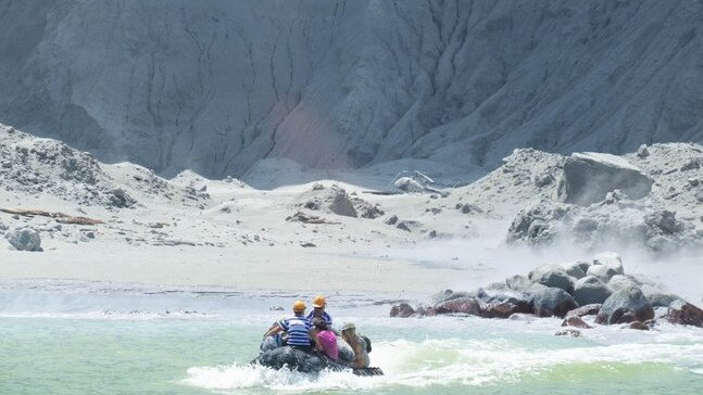 A White Island Tours boat rescues tourists. Picture: Michael Schade