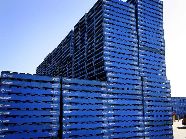 Brambles Ltd.'s CHEP pallets are stacked at CHEP's Dandenong South Service Centre outside Melbourne, Australia, on Monday, Aug. 17, 2009. Brambles Ltd., the world's biggest supplier of pallets used to move and store goods in factories, will announce full-year earnings on Aug. 20, 2009. Photographer: Luis Enrique Ascui/Bloomberg