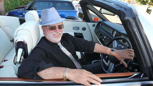 Lance Vater with his Rolls Royce Phantom Drophead Coupe which went viral after being left in the rain with the roof down.