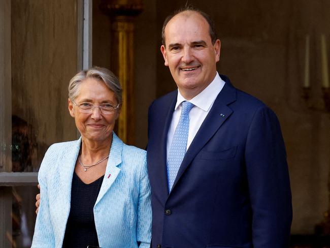 Ms Borne and France's outgoing prime minister Jean Castex at a handover ceremony in the courtyard of the Hotel Matignon, the French prime ministers' official residence, in Paris. Picture: AFP