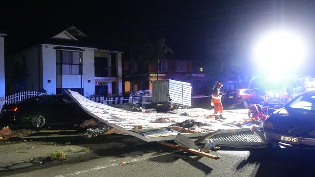 Trees and power lines were brought down and a roof ripped off a duplex at Belmore. Picture: Bill Hearne