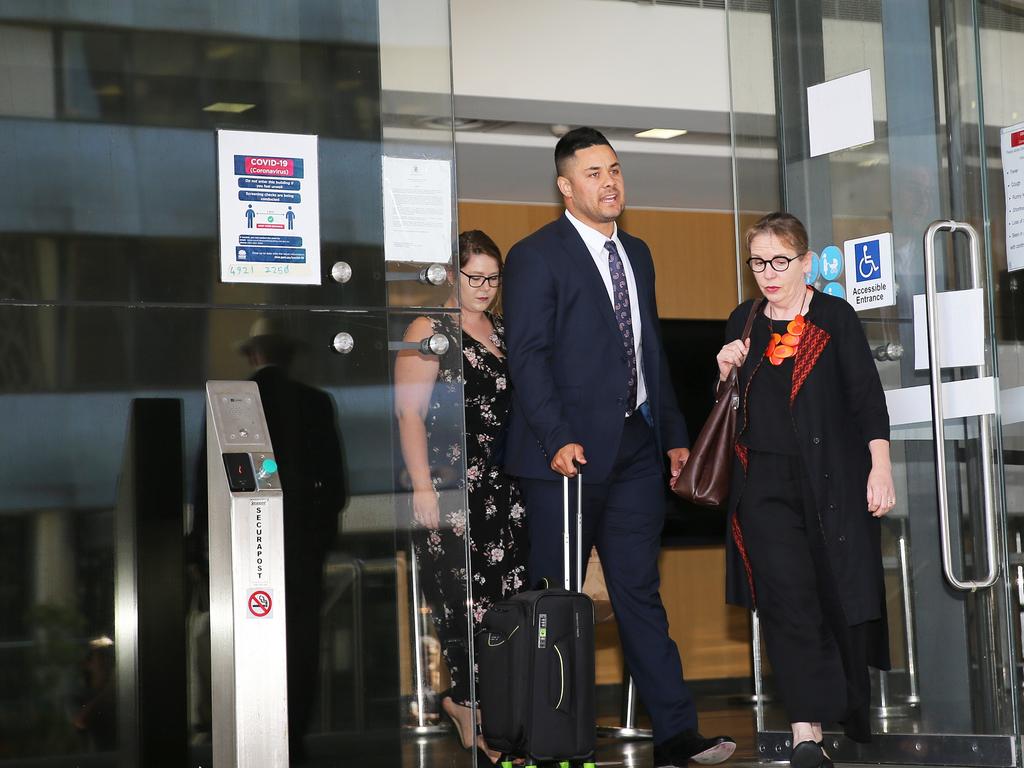 The footy star with his solicitor Penny Musgrave (right). Picture NCA NewsWire / Peter Lorimer.