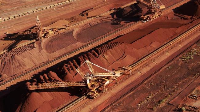 Despite improving iron ore prices, the Federal Budget isn’t in great shape. Picture: AFP / BHP Billiton