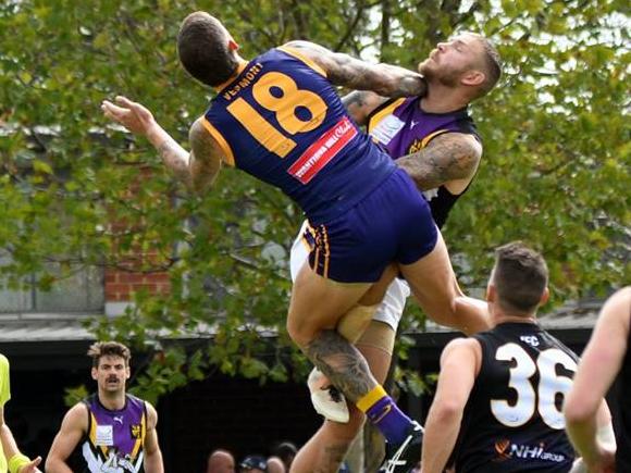 Robbie Ross goes up in the ruck. Picture: Field of View Sports Photography