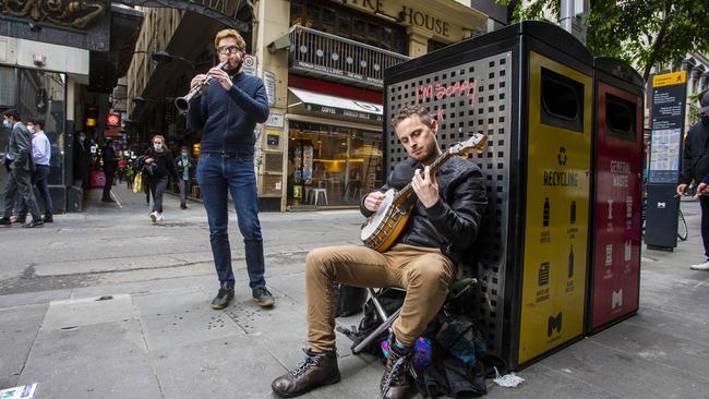 Buskers John Hunt, left, and Ben Harrison in Melbourne. Picture: Aaron Francis