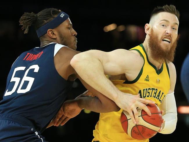 International Basketball Series Australian Boomers V USA Basketball at Marvel Stadium, Saturday August 24, 2019. Myles Turner of Team USA in action against Aron Baynes of the Boomers. Picture: Mark Stewart