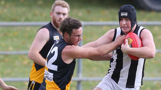 Jack Hazendonk shrugs a tackler. Picture: Yuri Kouzmin