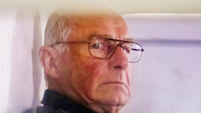 Craig Greenhill's Walkley Award finalist image for News Photography, "Roger Rogerson" - Roger Rogerson inside a police truck being taken into Bankstown Court to face charges relating to the murder of Jamie Gao. Picture Craig Greenhill