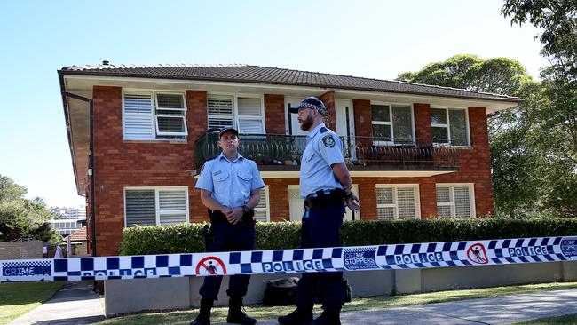 Police outside the property where a body was found. Picture: Toby Zerna