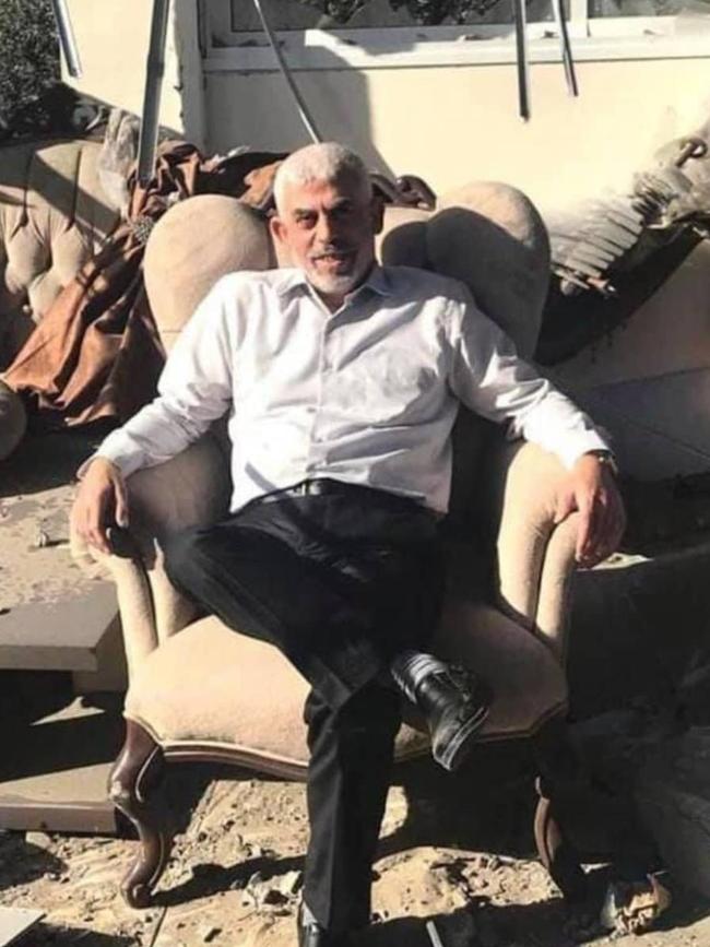 A picture of Yahya Sinwar sitting in the rubble of his home circulated on Israeli media in 2021.