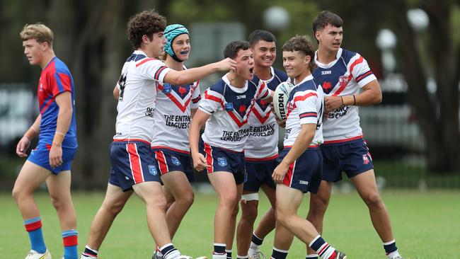 The Central Coast Roosters celebrate in the Andrew Johns Cup Grand Final. Picture: Sue Graham