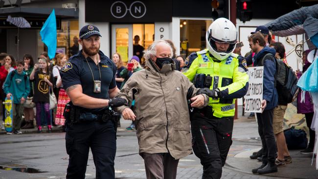 Extinction Rebellion protester arrested in Hobart CBD after Dead Sea March. It's not suggested this person was charged. Picture: Josh Agnew/ Pulse FM Hobart